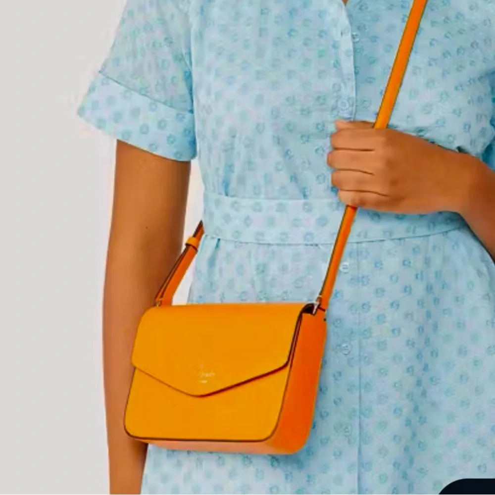 Kate Spade NY Sadie Envelope Crossbody in Turmeric Root Bright Orange K7338